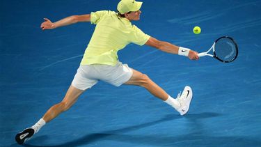 Italy's Jannik Sinner hits a return against USA's Ben Shelton during their men's singles semi-final match on day thirteen of the Australian Open tennis tournament in Melbourne on January 24, 2025. 
Yuichi YAMAZAKI / AFP