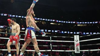 USA's Jake Paul celebrates winning the cruiserweight boxing bout against Mexico's Julio Cesar Chavez Jr. (L) at the Honda Center in Anaheim, California, on June 28, 2025.  
Patrick T. Fallon / AFP