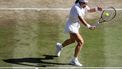 Czech Republic's Karolina Muchova returns against Japan's Naomi Osaka during their women's singles quarter-final tennis match on the ninth day of the 2026 Wimbledon Championships at The All England Lawn Tennis and Croquet Club in Wimbledon, southwest London, on July 7, 2026. 
Henry NICHOLLS / AFP