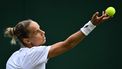 Netherlands' Arantxa Rus serves against Greece's Maria Sakkari during their women's singles second round tennis match on the third day of the 2024 Wimbledon Championships at The All England Lawn Tennis and Croquet Club in Wimbledon, southwest London, on July 3, 2024. 
Ben Stansall / AFP