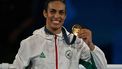 Gold medallist Algeria's Imane Khelif poses on the podium during the medal ceremony for the women's 66kg final boxing category during the Paris 2024 Olympic Games at the Roland-Garros Stadium, in Paris on August 9, 2024. 
Mauro PIMENTEL / AFP