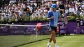 Australia's Alex de Minaur reacts as he plays against Italy's Lorenzo Musetti during their men's singles round of 32 match at the Cinch ATP tennis Championships at Queen's Club in west London on June 18, 2024. 
Ben Stansall / AFP