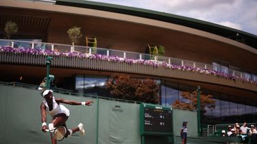 Canada's Victoria Mboko returns the ball to US player Hailey Baptiste during their women's singles second round tennis match on the fourth day of the 2025 Wimbledon Championships at The All England Lawn Tennis and Croquet Club in Wimbledon, southwest London, on July 3, 2025. 
HENRY NICHOLLS / AFP