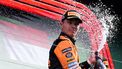 Winner McLaren's British driver Lando Norris celebrates during the podium ceremony after the Formula One Dutch Grand Prix at The Circuit Zandvoort, western Netherlands, on August 25, 2024. 
JOHN THYS / AFP