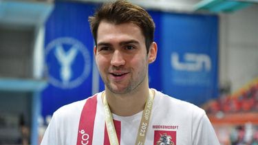 Russian swimmer Kliment Kolesnikov answers AFP journalists' questions during the 