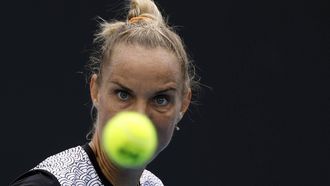 epa11086152 Arantxa Rus of Netherlands in action against Anna Kalinskaya of Russia during the Women's Singles match at the Australian Open tennis tournament in Melbourne, Australia, 18 January 2024.  EPA/MAST IRHAM