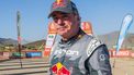 Team Audi Sport's Spanish driver Carlos Sainz poses for a photo after the finish line of the stage 11 of the 2024 Dakar Rally between Al-Ula and Yanbu, Saudi Arabia, on January 18, 2024. 
PATRICK HERTZOG / AFP