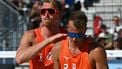 Netherlands' #01 Stefan Boermans and Netherlands' #02 Yorick De Groot react after loosing a point in the men's quarterfinal beach volleyball match between Germany and Netherlands during the Paris 2024 Olympic Games at the Eiffel Tower Stadium in Paris on August 6, 2024. 
CARL DE SOUZA / AFP