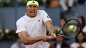 Germany's Alexander Zverev returns the ball to Argentina's Francisco Cerundolo during their 2025 ATP Tour Madrid Open tennis tournament fourth round singles match at the Caja Magica in Madrid, on April 29, 2025. 
Pierre-Philippe MARCOU / AFP