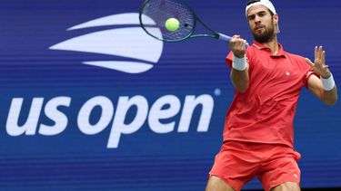 Russia's Karen Khachanov hits a return to Belgium's Alexander Blockx during their men's singles quarter-final tennis match on day eleven of the US Open tennis tournament at the USTA Billie Jean King National Tennis Center in New York on September 9, 2026. 
TIMOTHY A. CLARY / AFP