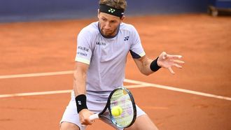 Norway's Casper Ruud returns the ball to Greece's Stefanos Tsitsipas during the ATP Barcelona Open 