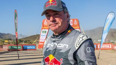 Team Audi Sport's Spanish driver Carlos Sainz poses for a photo after the finish line of the stage 11 of the 2024 Dakar Rally between Al-Ula and Yanbu, Saudi Arabia, on January 18, 2024. 
PATRICK HERTZOG / AFP