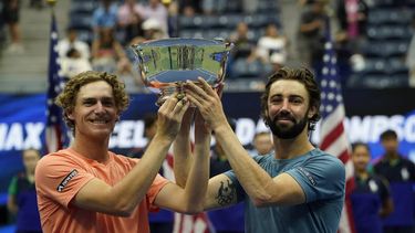 Australia's Max Purcell (L) and Jordan Thompson (R) celebrate defeating Germany's Kevin Krawietz and Tim Puetz on day thirteen  during their men's doubles final match against of the US Open tennis tournament at the USTA Billie Jean King National Tennis Center in New York City, on September 7, 2024. 
TIMOTHY A. CLARY / AFP