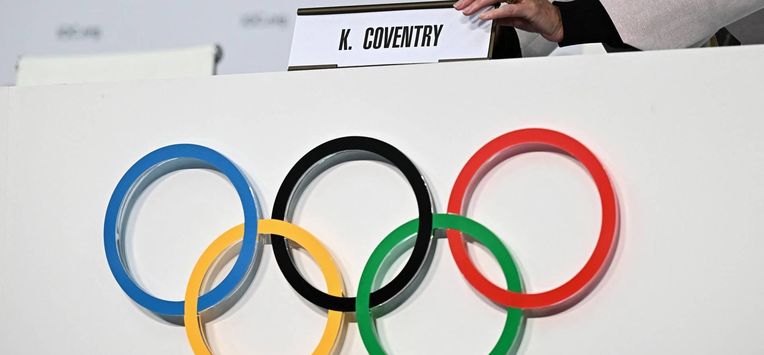 A IOC staff member displays the name of newly-elected Zimbabwean Kirsty Coventry before her press conference as part of the 144th IOC Session on the day of the election of the President of the International Olympic Committee (IOC), in Costa Navarino, Greece on March 20, 2025. Zimbabwe's Kirsty Coventry became the first woman and the first African to be elected president of the International Olympic Committee on March 20, 2025.
Fabrice COFFRINI / AFP