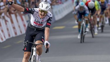 epa12069577 Jay Vine from Australia of UAE Team Emirates XRG celebrates after crossing the finish line to win the third stage of the Tour de Romandie cycling tour over 183.1km from Cossonay to Cossonay, Switzerland, 02 May 2025.  EPA/JEAN-CHRISTOPHE BOTT