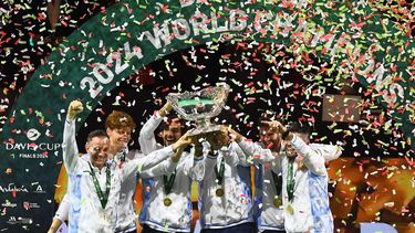 Team Italy celebrate with their trophy after winning the Davis Cup Finals at the Palacio de Deportes Jose Maria Martin Carpena arena in Malaga, southern Spain, on November 24, 2024. 
JORGE GUERRERO / AFP