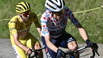 Team Visma - Lease a Bike team's Danish rider Jonas Vingegaard cycles ahead of UAE Team Emirates team's Slovenian rider Tadej Pogacar wearing the overall leader's yellow jersey  in the final ascent of the Plateau de Beille during the 15th stage of the 111th edition of the Tour de France cycling race, 197,7 km between Loudenvielle and Plateau de Beille, in the Pyrenees mountains, southwestern France, on July 14, 2024. 
Marco BERTORELLO / AFP