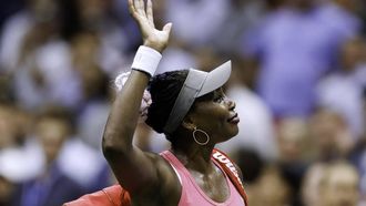 USA's Venus Williams waves to the crowd as she leaves the court after her defeat against Belgium's Greet Minnen during the US Open tennis tournament women's singles first round match at the USTA Billie Jean King National Tennis Center in New York City, on August 29, 2023. 
KENA BETANCUR / AFP