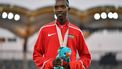 Kenya’s Rodgers Kwemoi (bronze) poses with his medal a day after the atheltics men’s 10000m final during the 2018 Gold Coast Commonwealth Games at the Carrara Stadium on the Gold Coast on April 14, 2018. 
SAEED KHAN / AFP