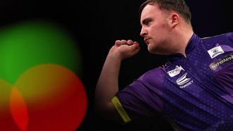 England's Luke Littler competes during his semi-final darts match against England's Michael Smith on Night 1 of the PDC Premier League, at the Utilita Arena in Cardiff, south Wales on February 1, 2024. 
Adrian DENNIS / AFP