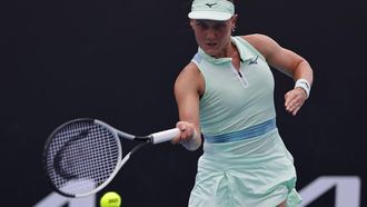 epa11825286 Suzan Lamens of Netherlands in action during the Women's round 2 match against Belinda Bencic of Switzerland at the Australian Open tennis tournament in Melbourne, Australia, 15 January 2025.  EPA/ROLEX DELA PENA