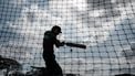 A Kenyan cricket player plays a shot during practice at the Nairobi Gymkhana Cricket Grounds in Nairobi on August 24, 2022, ahead of the international cricket matches between Kenya and Nepal.  
Yasuyoshi CHIBA / AFP