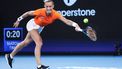 Netherlands' Arantxa Rus hits a return against Croatia's Donna Vekic during their women's singles match at the United Cup tennis tournament on Ken Rosewall Arena in Sydney on January 2, 2024. 
DAVID GRAY / AFP