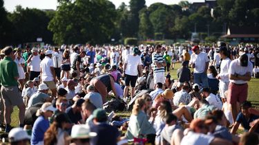 Tennis fans queue for tickets on the first day of the 2025 Wimbledon Championships at The All England Lawn Tennis and Croquet Club in Wimbledon, southwest London, on June 30, 2025. 
HENRY NICHOLLS / AFP