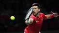 Serbia's Novak Djokovic returns the ball against Italy's Jannik Sinner during the second men's singles semifinal tennis match between Italy and Serbia of the Davis Cup tennis tournament at the Martin Carpena sportshall, in Malaga on November 25, 2023. 
LLUIS GENE / AFP
