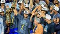 epa13035766 New York Knicks guard Jalen Brunson (C) holds up the Bill Russell MVP award after winning Game 5 of the NBA Finals between the San Antonio Spurs and the New York Knicks, San Antonio, USA, 13 June 2026.  EPA/ADAM DAVIS  SHUTTERSTOCK OUT