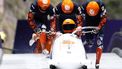 Netherlands' Dave Wesselink, Netherlands' Janko Franjic, Netherlands' Jelen Franjic and Netherlands' Timme Koster compete in the bobsleigh men's 4-man heat 3 at Cortina Sliding Centre during the Milano Cortina 2026 Winter Olympic Games in Cortina d'Ampezzo on February 22, 2026. 
FRANCK FIFE / AFP