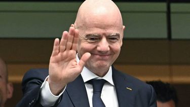 FIFA President Gianni Infantino gestures from the stands ahead of the 2026 World Cup football tournament semi-final match between France and Spain at the Dallas Stadium in Arlington on July 14, 2026. 

RONALDO SCHEMIDT / AFP