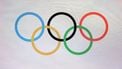 The photograph shows Olympic Rings during a ceremony to mark one year until the start of Milano Cortina Olympics in Strehler Theatre, in Milan, on February 6, 2025, ahead of the Milano Cortina 2026 Winter Olympic and Paralympic Games. 
MARCO BERTORELLO / AFP