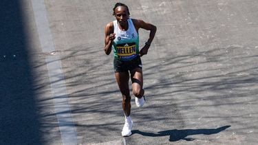 Kenyan distance runner Hellen Obiri approaches the finish line during the 129th Boston Marathon on April 21, 2025, in Boston, Massachusetts.  The marathon includes around 30,000 athletes from 129 countries running the 26.2 miles from Hopkinton to Boston, Massachusetts.  The event is the world's oldest annually run marathon. 
Joseph Prezioso / AFP