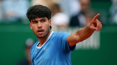 Spain's Carlos Alcaraz gestures as he plays against Italy's Jannik Sinner during the Monte Carlo ATP Masters Series Tournament final tennis match on Court Rainier III at the Monte-Carlo Country Club in Roquebrune-Cap-Martin, south-eastern France on April 12, 2026. 
Valery HACHE / AFP