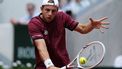 Netherlands' Tallon Griekspoor plays a backhand return to Germany's Alexander Zverev during their men's singles match on day 9 of the French Open tennis tournament on Court Suzanne-Lenglen at the Roland-Garros Complex in Paris on June 2, 2025. 
Dimitar DILKOFF / AFP