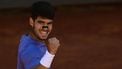 Spain's Carlos Alcaraz reacts during his men's singles semi-final match against Italy's Lorenzo Musetti for the ATP Rome Open tennis tournament at Foro Italico in Rome on May 16, 2025.  
Tiziana FABI / AFP