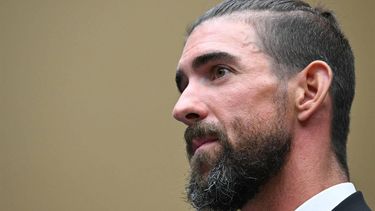 Former US Olympian Michael Phelps looks on as he testifies before a House Oversight and Investigations Subcommittee hearing on anti-doping measures ahead of the 2024 Paris Olympics on Capitol Hill in Washington, DC, June 25, 2024. 
Jim WATSON / AFP