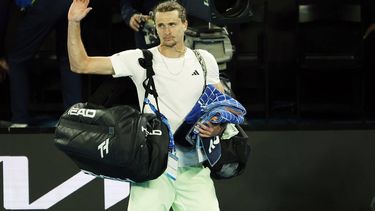 epa11105867 Alexander Zverev of Germany leaves the court after losing his Men's semifinal match against Daniil Medvedev of Russia at the Australian Open tennis tournament in Melbourne, Australia, 26 January 2024.  EPA/MAST IRHAM