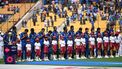 2023-11-09 09:36:07 Sri Lanka's players stand for their national anthem before the start of the 2023 ICC Men's Cricket World Cup one-day international (ODI) match between New Zealand and Sri Lanka at the M. Chinnaswamy Stadium in Bengaluru on November 9, 2023. 
R.Satish BABU / AFP