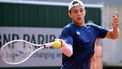epa11379941 Tallon Griekspoor of the Netherlands in action during his Men's Singles 2nd round match against Luciano Darderi of Italy during the French Open Grand Slam tennis tournament at Roland Garros in Paris, France, 30 May 2024.  EPA/CAROLINE BLUMBERG