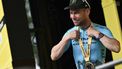 Astana Qazaqstan Team's British rider Mark Cavendish celebrates on the podium after winning the 5th stage of the 111th edition of the Tour de France cycling race, 177,5 km between Saint-Jean-de-Maurienne and Saint-Vulbas, on July 3, 2024. 
Marco BERTORELLO / AFP