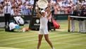 Poland's Iga Swiatek celebrates with the winner's trophy, the Venus Rosewater Dish, after winning against US player Amanda Anisimova during their women's singles final tennis match on the thirteenth day of the 2025 Wimbledon Championships at The All England Lawn Tennis and Croquet Club in Wimbledon, southwest London, on July 12, 2025. 
HENRY NICHOLLS / AFP