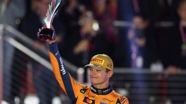 Second place finisher McLaren's British driver Lando Norris holds his trophy on the podium after the Las Vegas Formula One Grand Prix at the Las Vegas Strip Circuit in Las Vegas, Nevada, on November 22, 2025. Formula One world champion Max Verstappen produced a masterful drive to win the Las Vegas Grand Prix on Saturday as McLaren's Lando Norris finished second to edge closer to a maiden drivers' title.
Red Bull ace Verstappen pounced on a slip by pole-sitter Norris on the first turn of Sin City's street circuit to grab the lead and controlled the race thereafter to claim the 69th Grand Prix win of his career, finishing more than 20 seconds clear.

Patrick T. Fallon / AFP