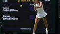 Belarus's Aryna Sabalenka plays a backhand return to US-Canada's Carson Branstine during their women's singles first round tennis match on the first day of the 2025 Wimbledon Championships at The All England Lawn Tennis and Croquet Club in Wimbledon, southwest London, on June 30, 2025. 
Adrian Dennis / AFP