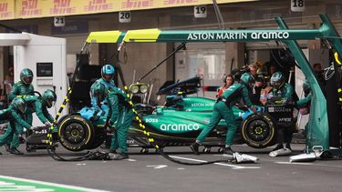 Aston Martin's Spanish driver Fernando Alonso is pushed into his garage after retiring during the Mexico City Grand Prix at the Hermanos Rodriguez racetrack, in Mexico City on October 27, 2024. 
CARLOS PEREZ GALLARDO / POOL / AFP