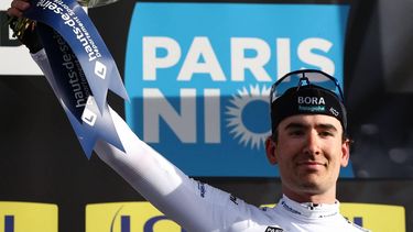 Red Bull-Bora-Hansgrohe's Dutch rider Mick Van Dijke wearing the best young rider's white jersey celebrates on the podium after the 2nd stage of the Paris-Nice cycling race, 183,9 km between Montesson and Bellegarde, on March 10, 2025. 
Anne-Christine POUJOULAT / AFP