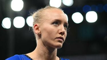 Netherlands' Lieke Wevers reacts after competing in the uneven bars event of the artistic gymnastics women's qualification during the Paris 2024 Olympic Games at the Bercy Arena in Paris, on July 28, 2024. 
Paul ELLIS / AFP