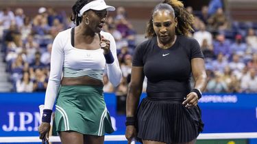 USA's Serena Williams (R) and Venus Williams confer as they play against Czech Republic's Lucie Hradecka and Linda Noskova during their 2022 US Open Tennis tournament women's doubles first round match at the USTA Billie Jean King National Tennis Center in New York, on September 1, 2022. 
COREY SIPKIN / AFP
