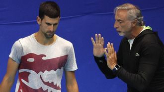 Serbia's Novak Djokovic (L) trains with Italian trainer Marco Panichi during the Tel Aviv Watergen Open 2022 in Israel's Mediterranean coastal city of Tel Aviv on September 28, 2022.  
JACK GUEZ / AFP